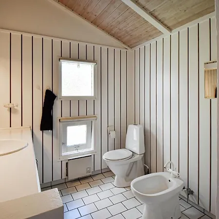Three-bedroom In Hébergement de vacances